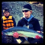 Mom and son fishing in Alaska
