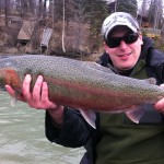 Happy customer shows off his catch on the Kenai