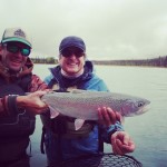 Kenai River Cooper Landing in the background, lady caught a big fish!